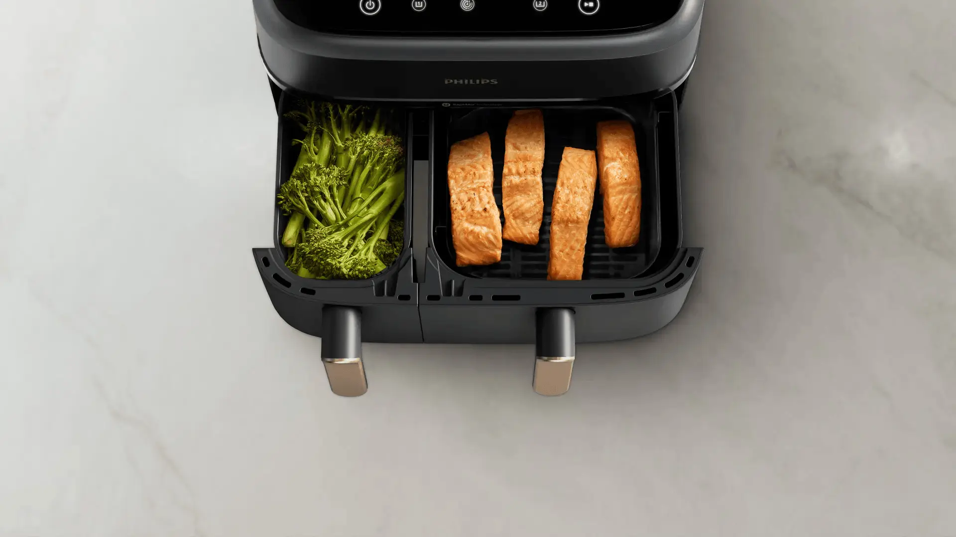 Geniet van een complete maaltijd met onze Dual Basket Airfryer Geniet van een complete maaltijd met onze Dual Basket Airfryer