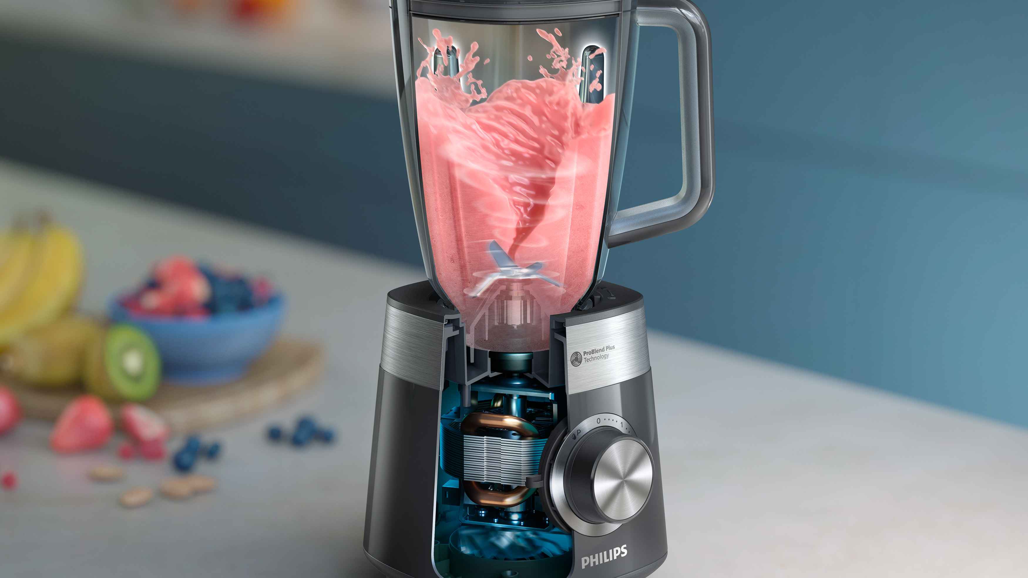 Detalj av en Philips Blend & Juice blender i aksjon, som lager en rosa smoothie med ProBlend Plus-teknologi, og viser kraft og effektivitet. Detalj av en Philips Blend & Juice blender i aksjon, som lager en rosa smoothie med ProBlend Plus-teknologi, og viser kraft og effektivitet.