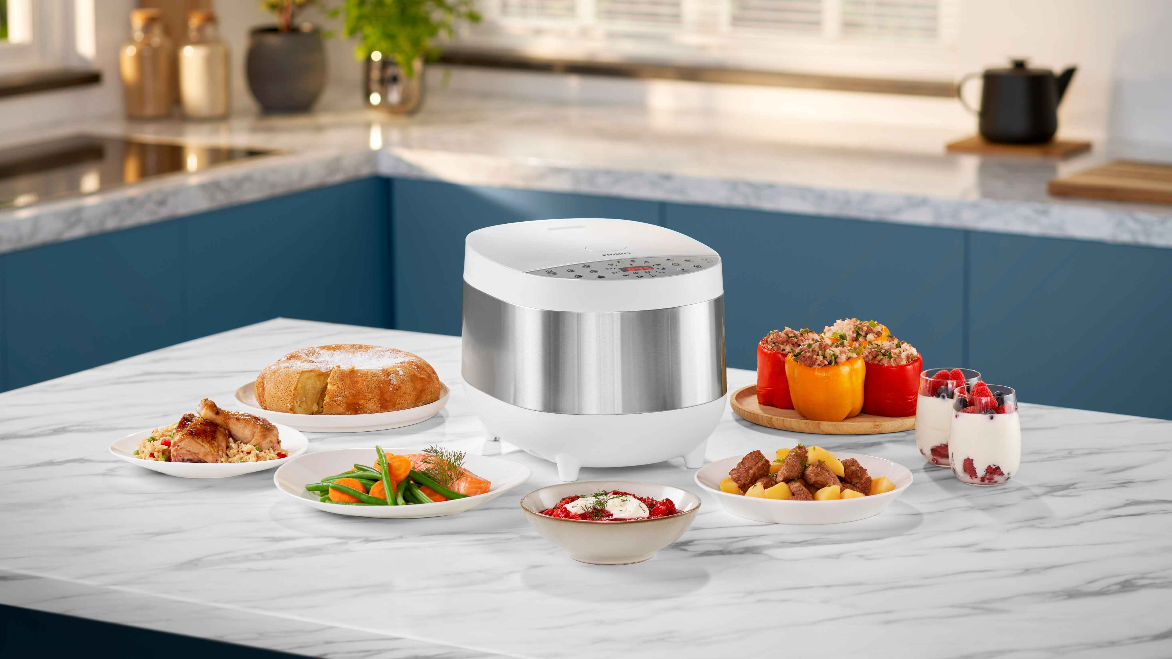 Philips Cookers-serie: Multicooker med digitalt display, børstet stål og hvit topp. Lag deilige måltider rundt den for å vise frem det overlegne designet og brukeropplevelsen. Philips Cookers-serie: Multicooker med digitalt display, børstet stål og hvit topp. Lag deilige måltider rundt den for å vise frem det overlegne designet og brukeropplevelsen.