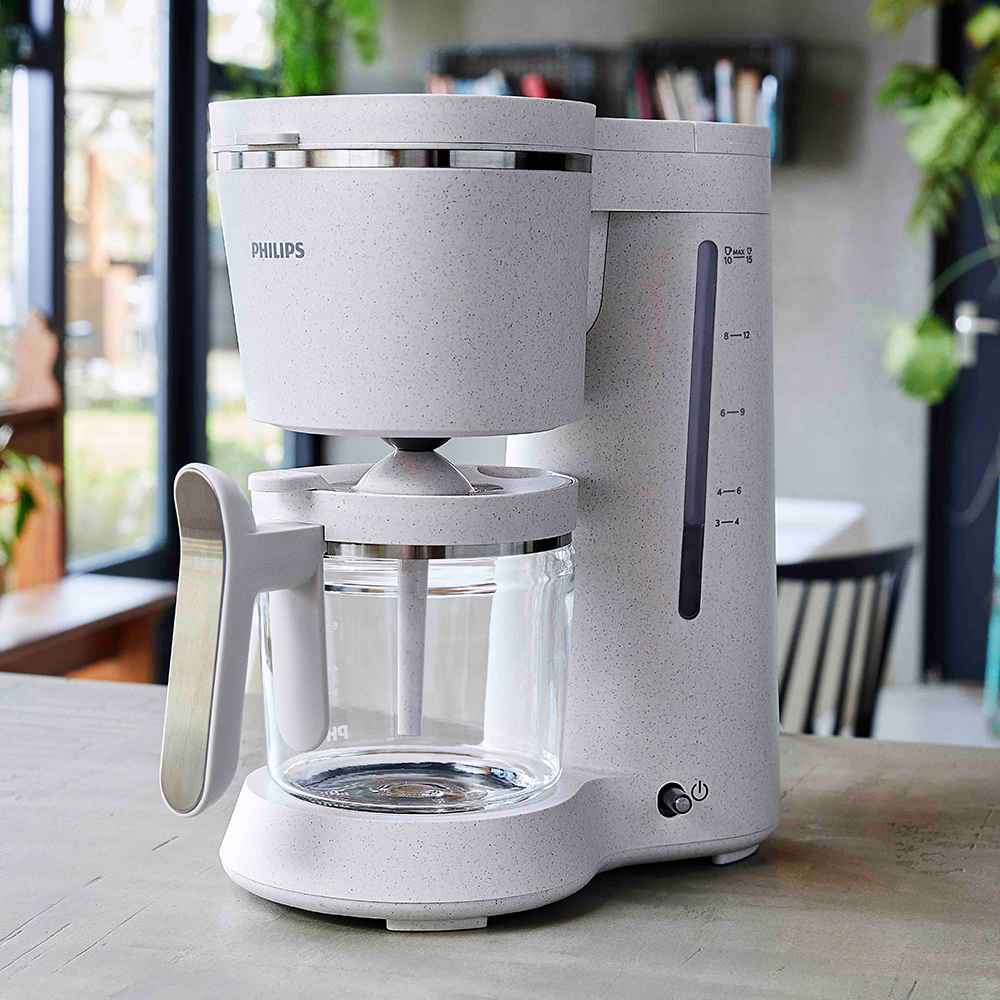 Philips Filterkaffeemaschine mit gesprenkelter Oberfläche und Glaskanne, entworfen für einfache Bedienung und hervorragenden Geschmack. Brühen Sie bis zu 12 Tassen für perfekten Kaffee. Philips Filterkaffeemaschine mit gesprenkelter Oberfläche und Glaskanne, entworfen für einfache Bedienung und hervorragenden Geschmack. Brühen Sie bis zu 12 Tassen für perfekten Kaffee.