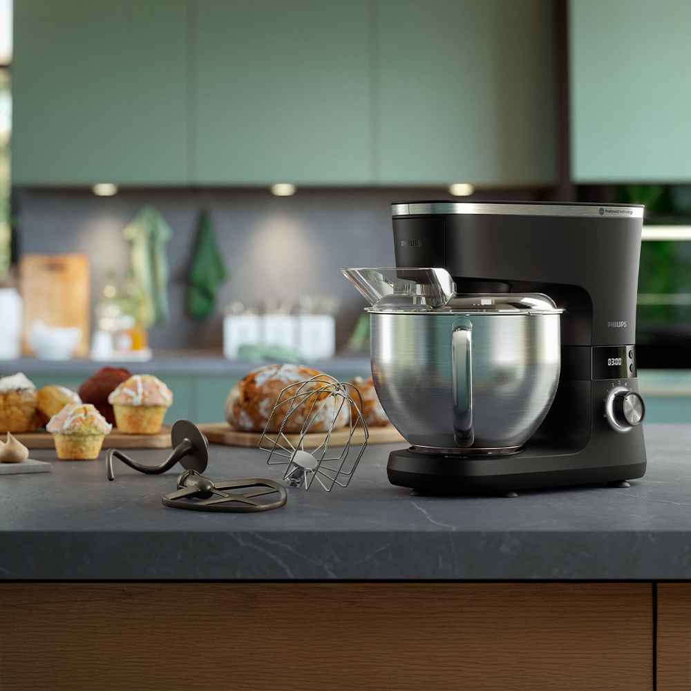 Die Philips Food Prep Küchenmaschine bietet unübertroffene Leistung. Schwarzer Mixer mit Edelstahlschüssel, inklusive Zubehör; zeigt fertiges Gebäck und erstklassiges Design. Die Philips Food Prep Küchenmaschine bietet unübertroffene Leistung. Schwarzer Mixer mit Edelstahlschüssel, inklusive Zubehör; zeigt fertiges Gebäck und erstklassiges Design.