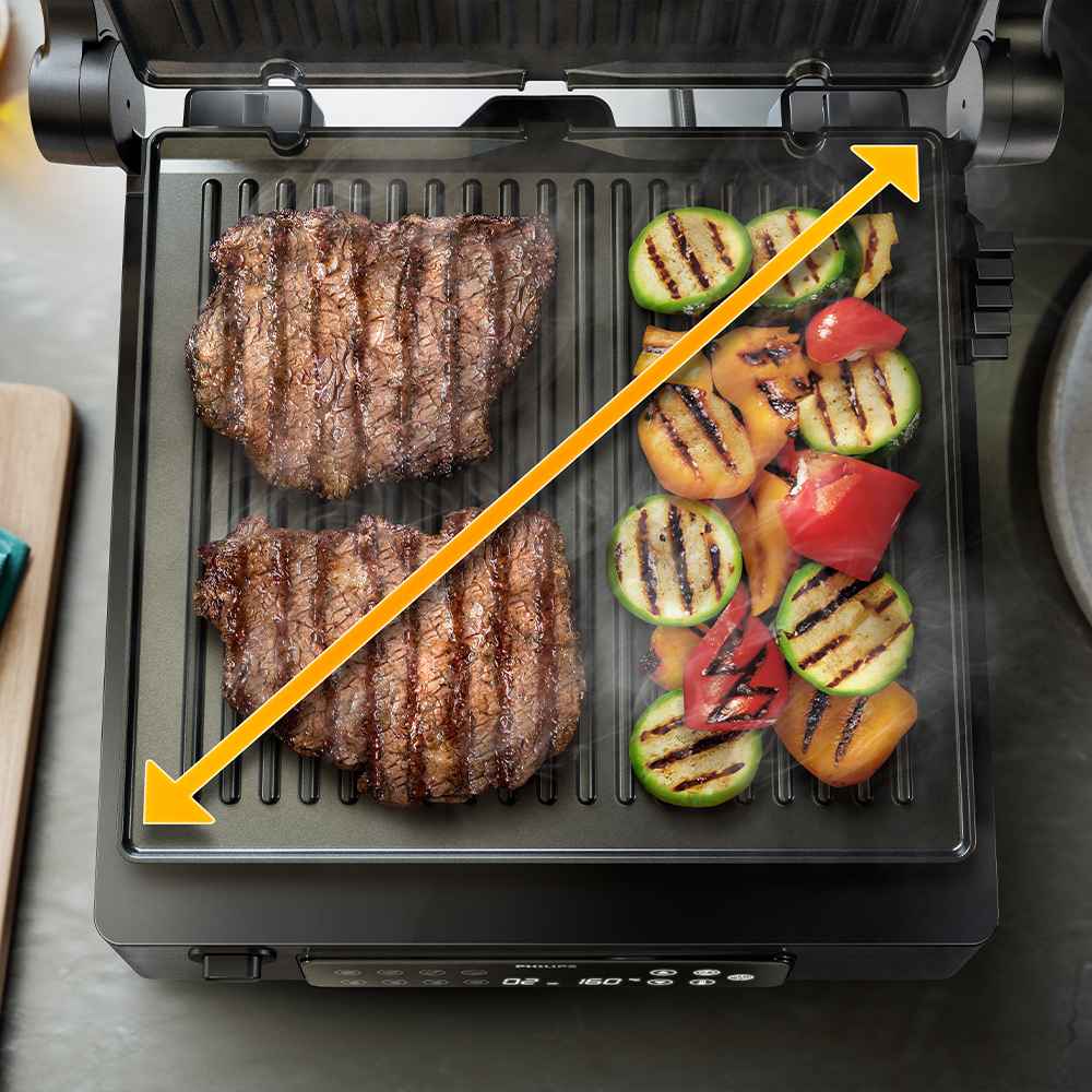 Philips grillit & leivänpaahtimet -sarja: näyttää pihvejä ja vihanneksia, jotka on grillattu täydellisesti Philips-grillillä, korostaen tasaista kypsennystä ja monipuolisuutta kulmamittarin ansiosta. Philips grillit & leivänpaahtimet -sarja: näyttää pihvejä ja vihanneksia, jotka on grillattu täydellisesti Philips-grillillä, korostaen tasaista kypsennystä ja monipuolisuutta kulmamittarin ansiosta.