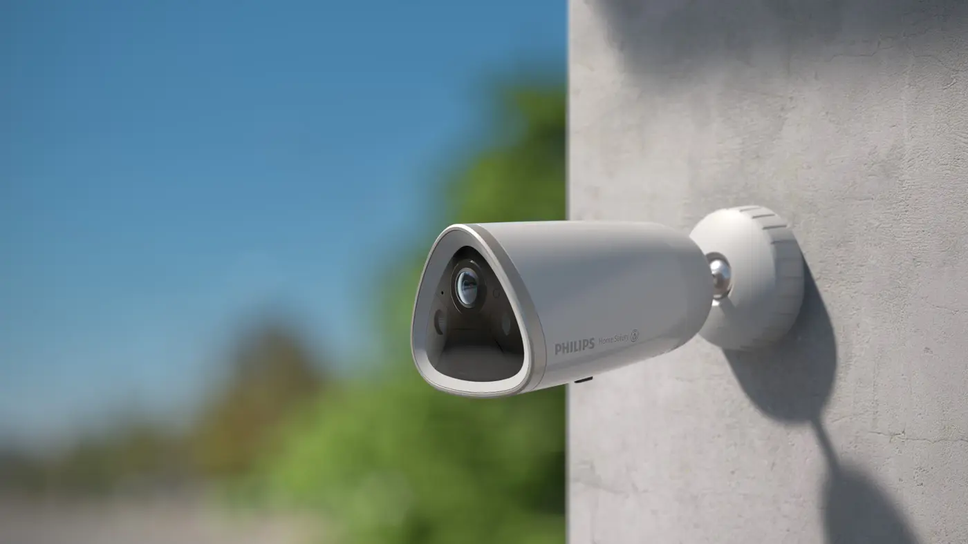 Philips outdoor security camera mounted on a wall, providing reliable home safety Philips outdoor security camera mounted on a wall, providing reliable home safety