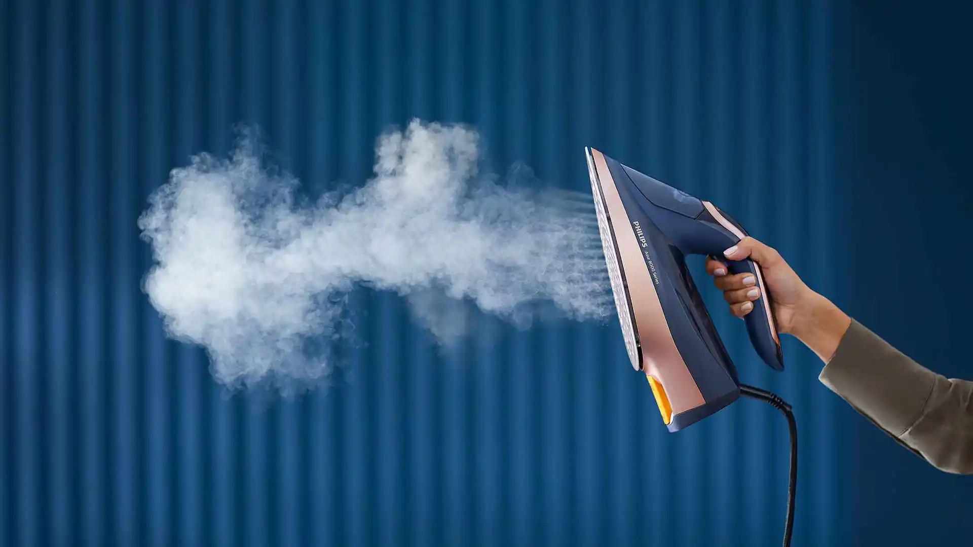 Automatic vertical steam shots for hanging garments Automatic vertical steam shots for hanging garments