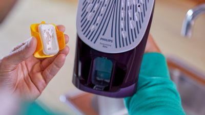 Sistema rapido di scarico del calcare